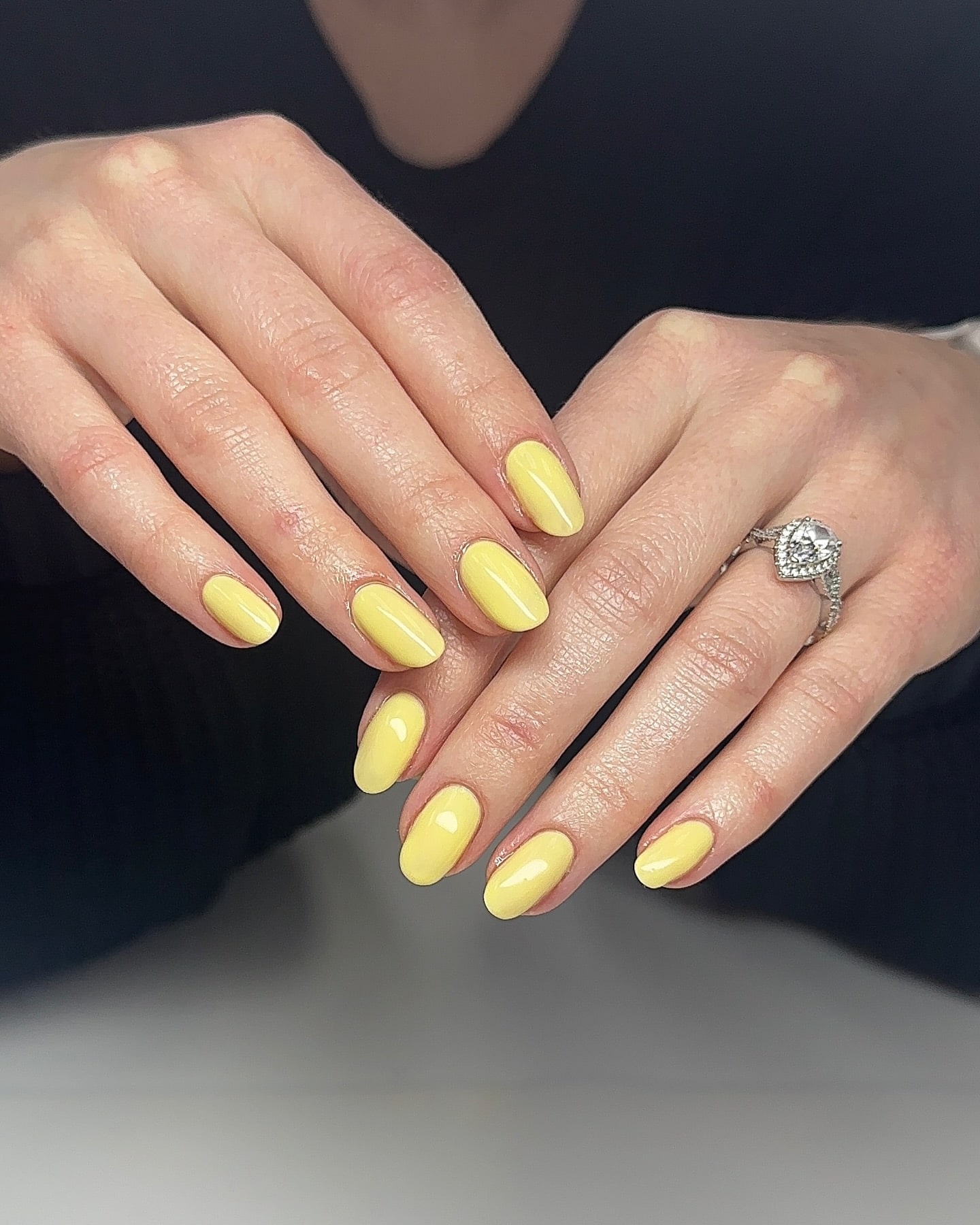 Simple Pastel Yellow Nails with Glossy Shine for Minimalist and Bright Nail Ideas