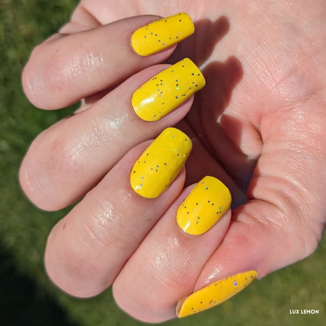 Square Lemon Yellow Nails with Silver Glitter Sparkle for Bright Summer Nail Ideas
