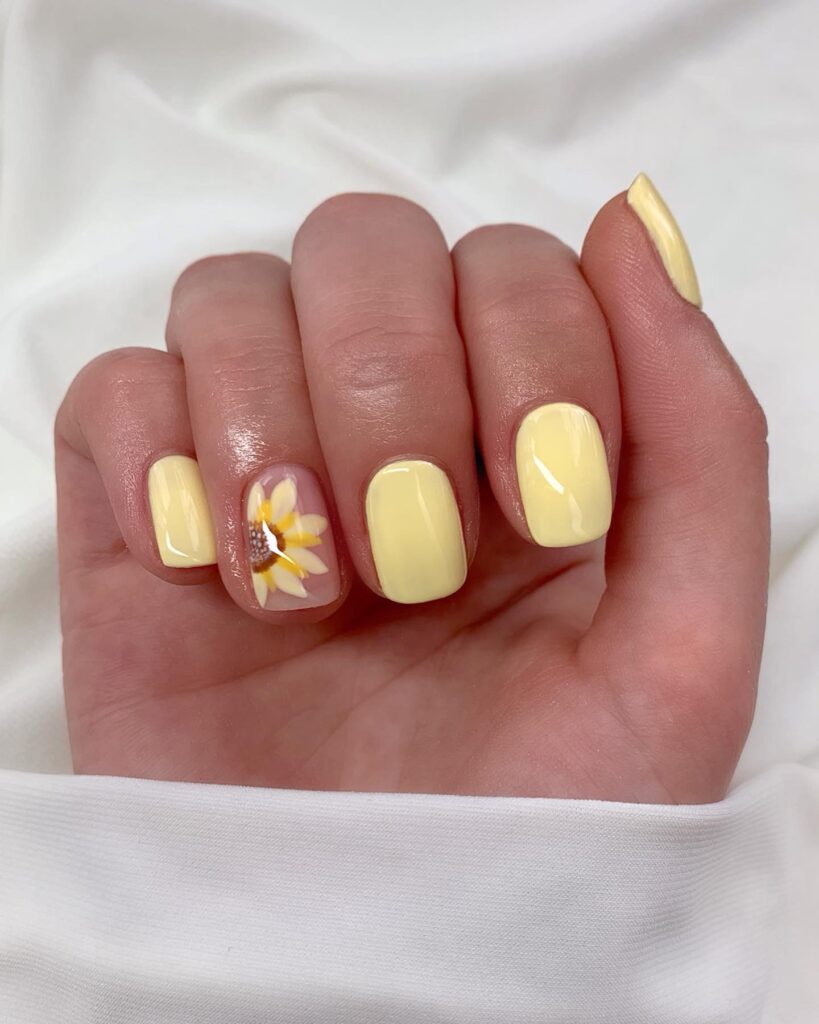 Square Pastel Yellow Nails with Sunflower Accent for Cute Floral Nail Ideas