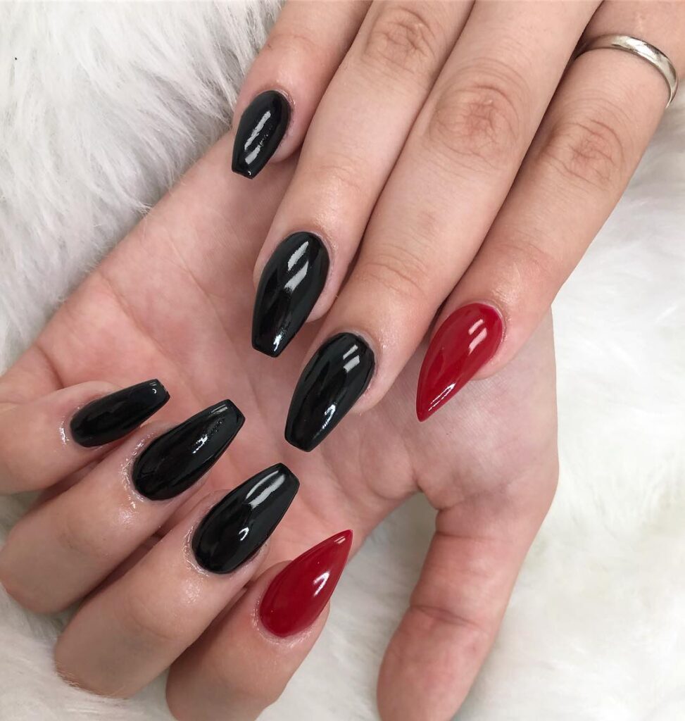 Stiletto Black and Red Accent Nails for a Fierce, High-Impact Look