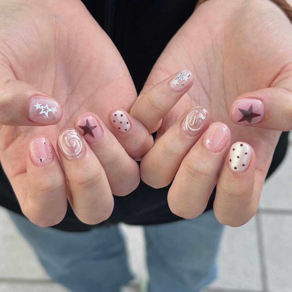 Stone-Inspired Short Nails with Pale Yellow French Tips and Black Flecks