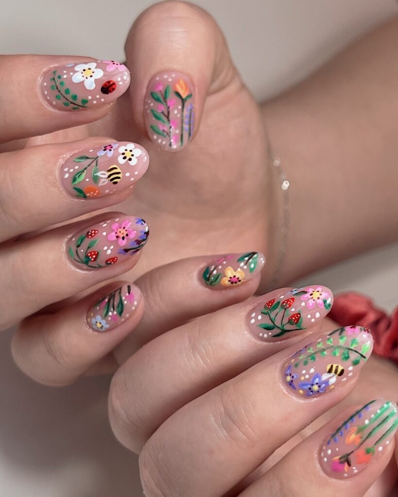 Whimsical Nature-Inspired Almond Nails with Florals, Strawberries, and Bees